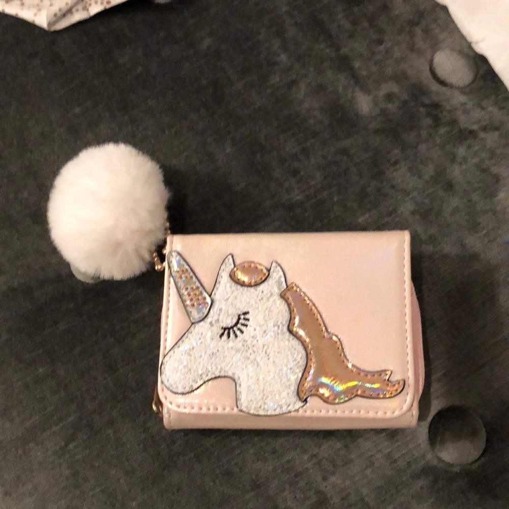 NWOT Unicorn trifold wallet. In iridescent pink.